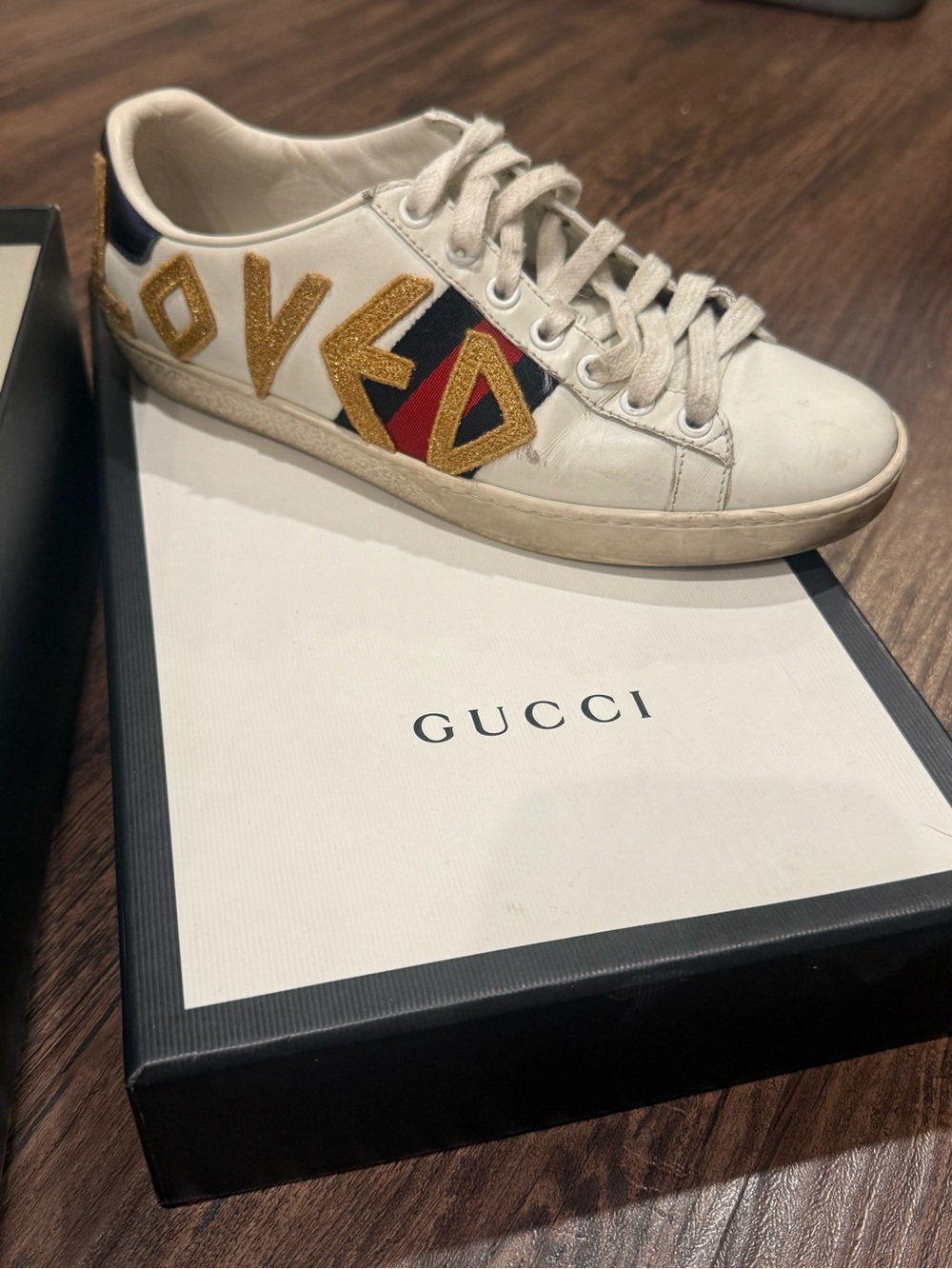Gucci White Leather Sneakers with Gold 'LOVED' Appliqué and Red-Blue Web